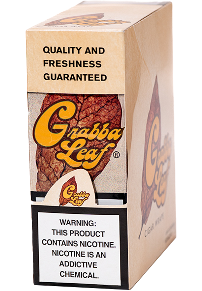 Two prepared natural grabba cigar wrappers beside the Grabba Leaf pouch.